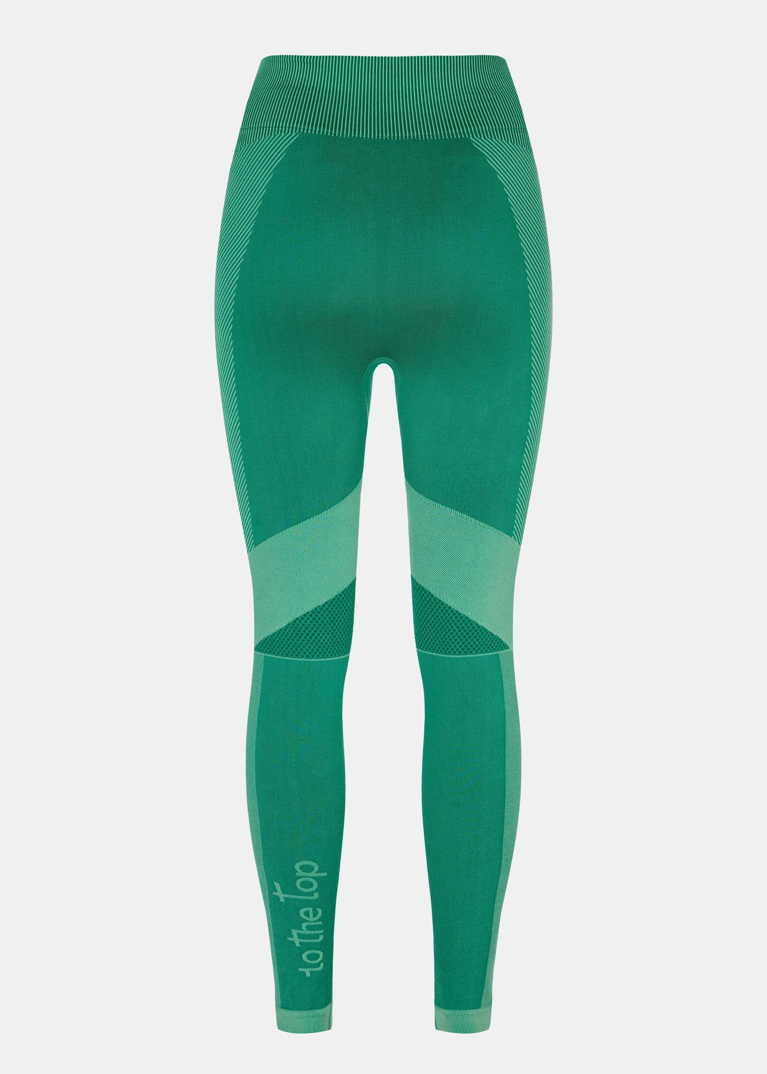 Green premium seamless leggings with clean, timeless design