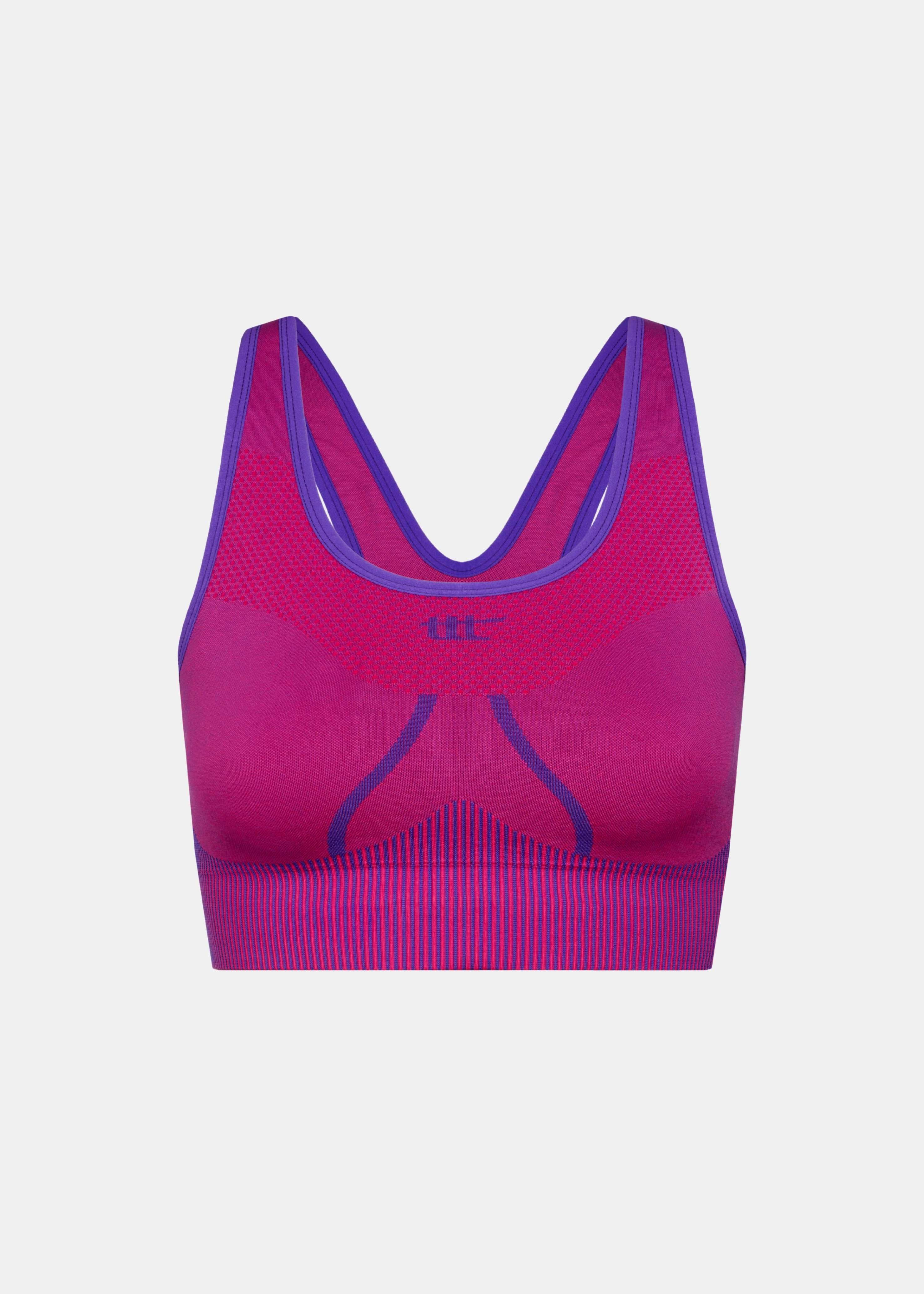 Seamless Sport-BH in Magenta mit Rundhalsausschnitt und breitem Bund – Frontansicht Freisteller.